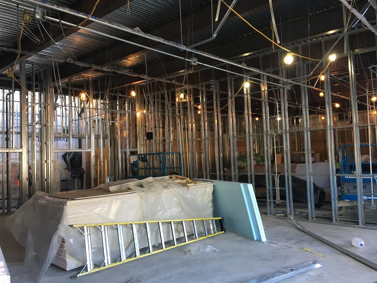 Steel stud wall framing in progress inside Klahowya school